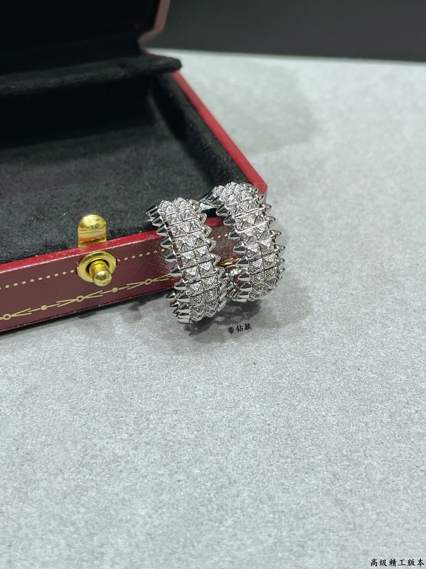 ca*t*er double-row bullet earrings with Di*m*nds