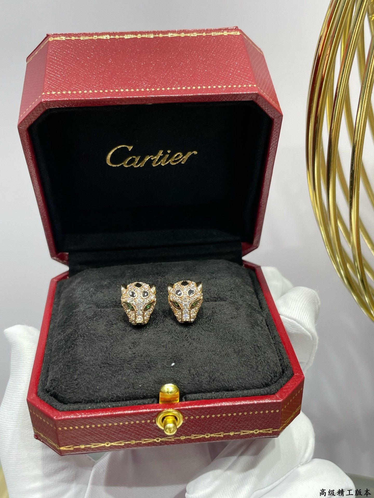 Ca*t*er earrings