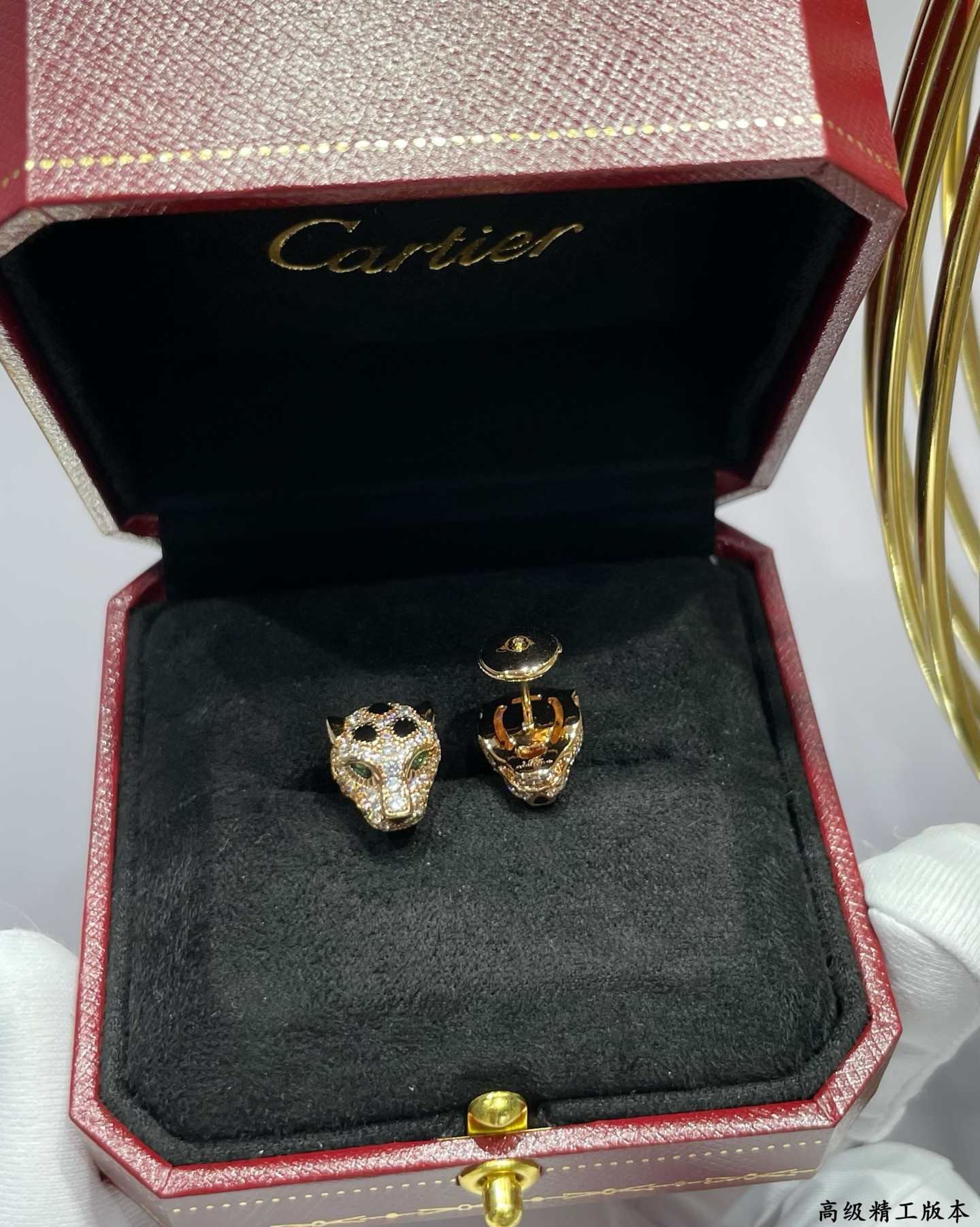 Ca*t*er earrings