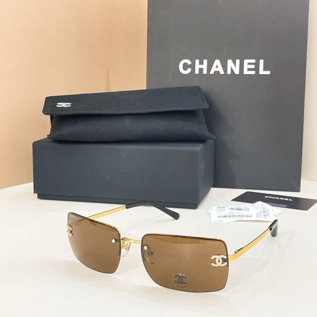 Ch*el crystal logo glasses