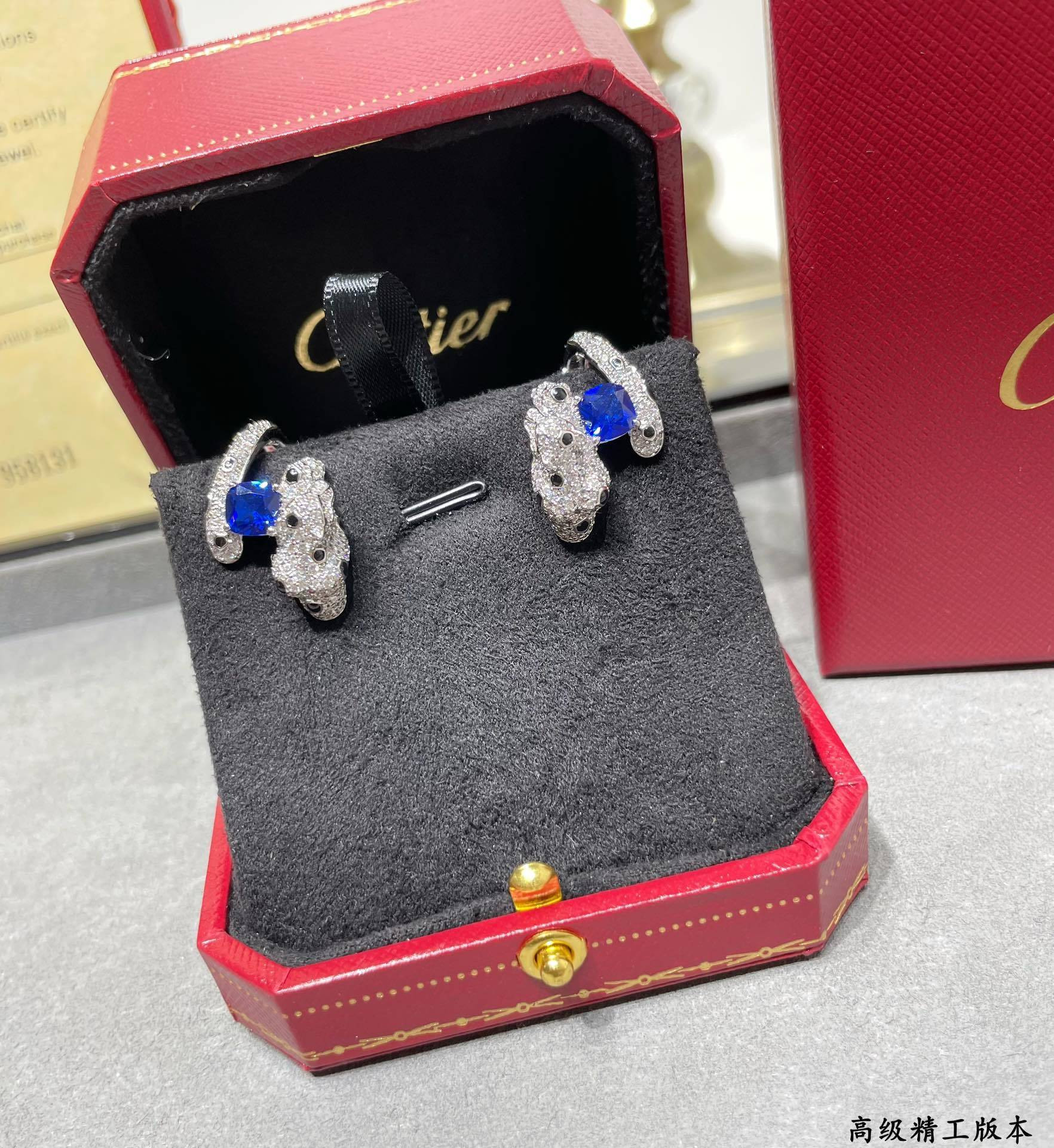 ca*t*er blue Di*m*nd panther earrings