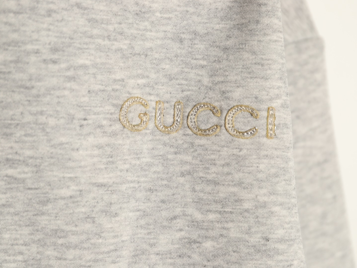 G*u*i coats