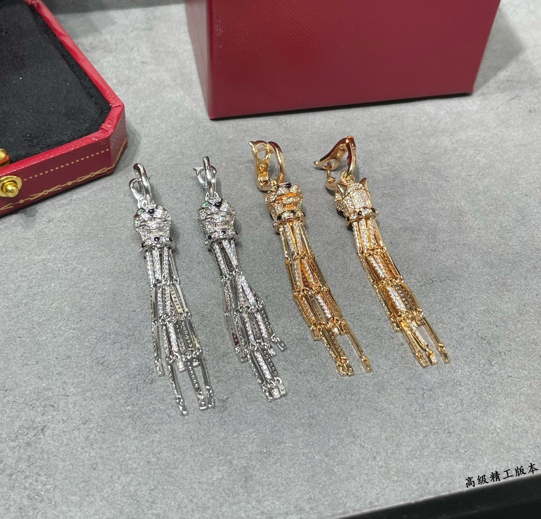 Ca*t*er spotted leopard tassel earrings