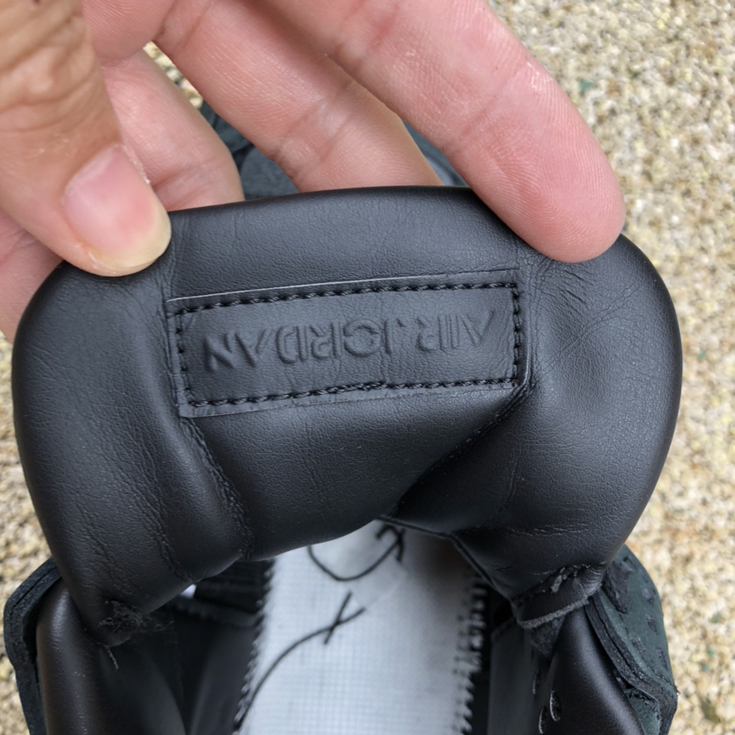 UA Jordan 4 Retro Kaws Black