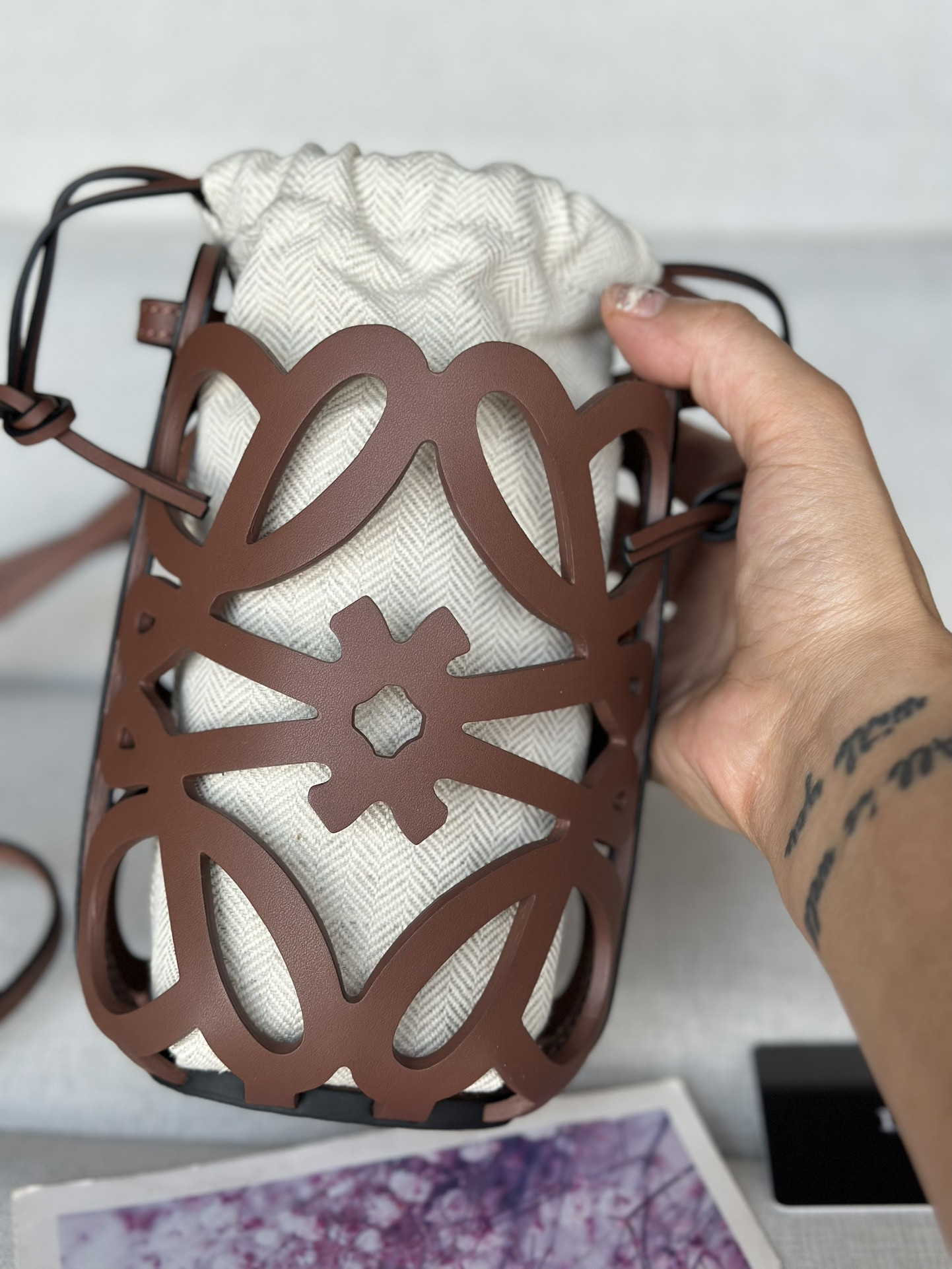 L0ew* anagram cut-out pocket in classic calfskin and canvas 20x11x8cm