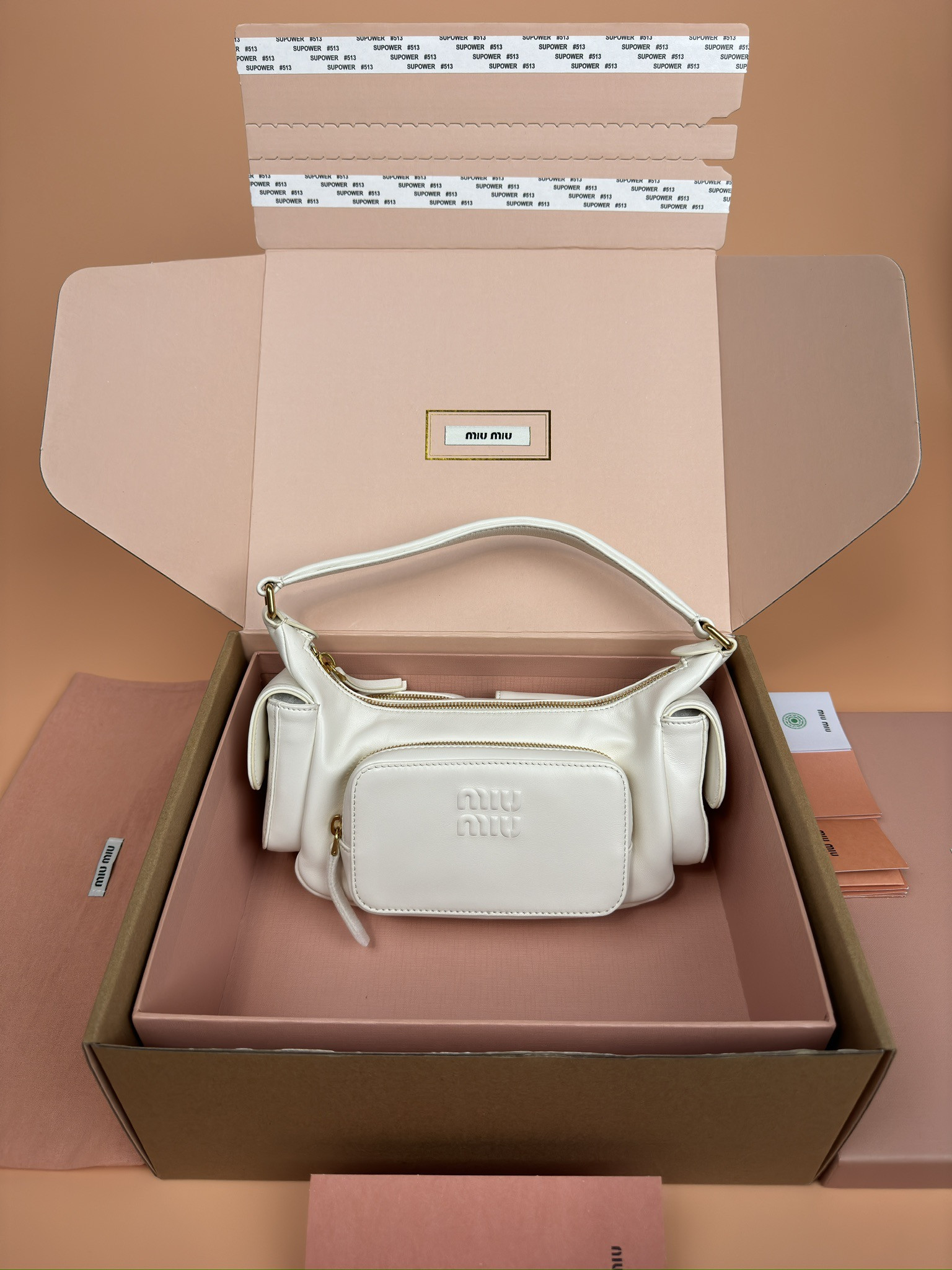 Miu Miu Hobo Nappa leather pocket bag  12x21x6cm